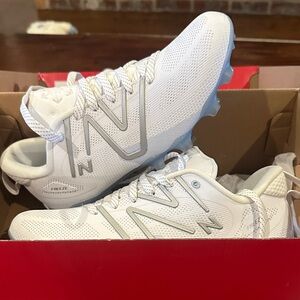 New Balance White Freeze 4 Low Cleats with Gray Accents